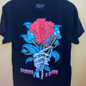Black T-shirt with with a red rose and blue mushrooms,